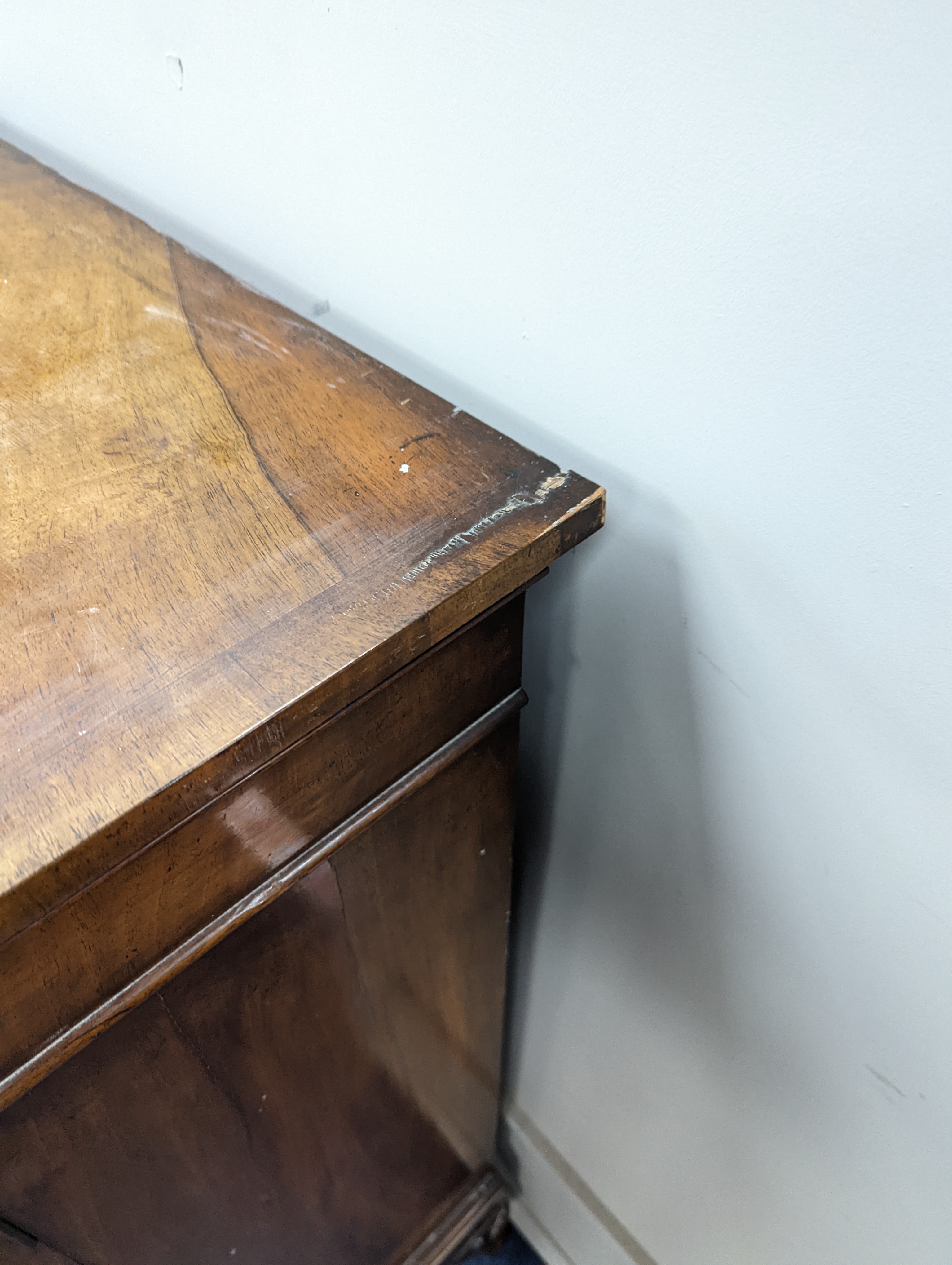 A Queen Anne revival walnut dwarf breakfront bookcase, length 182cm, depth 38cm, height 113cm